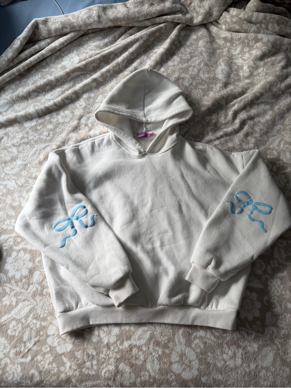 White Edikted Hoodie with Blue Bow Details